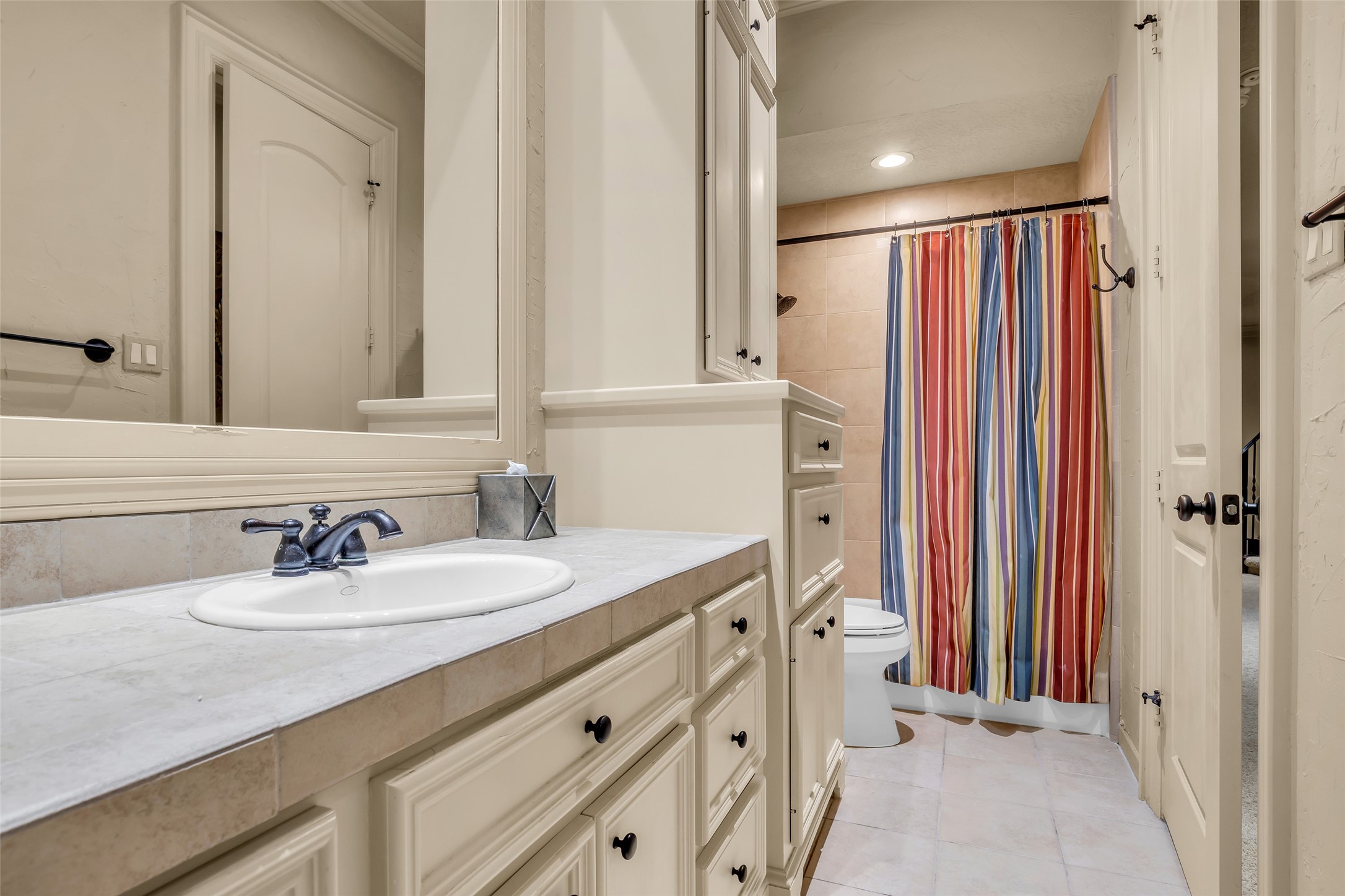 75 South Player Crest Circle Spring, TX 77382 - Photo 32 of 39 a bathroom with a sink double vanity and a mirror