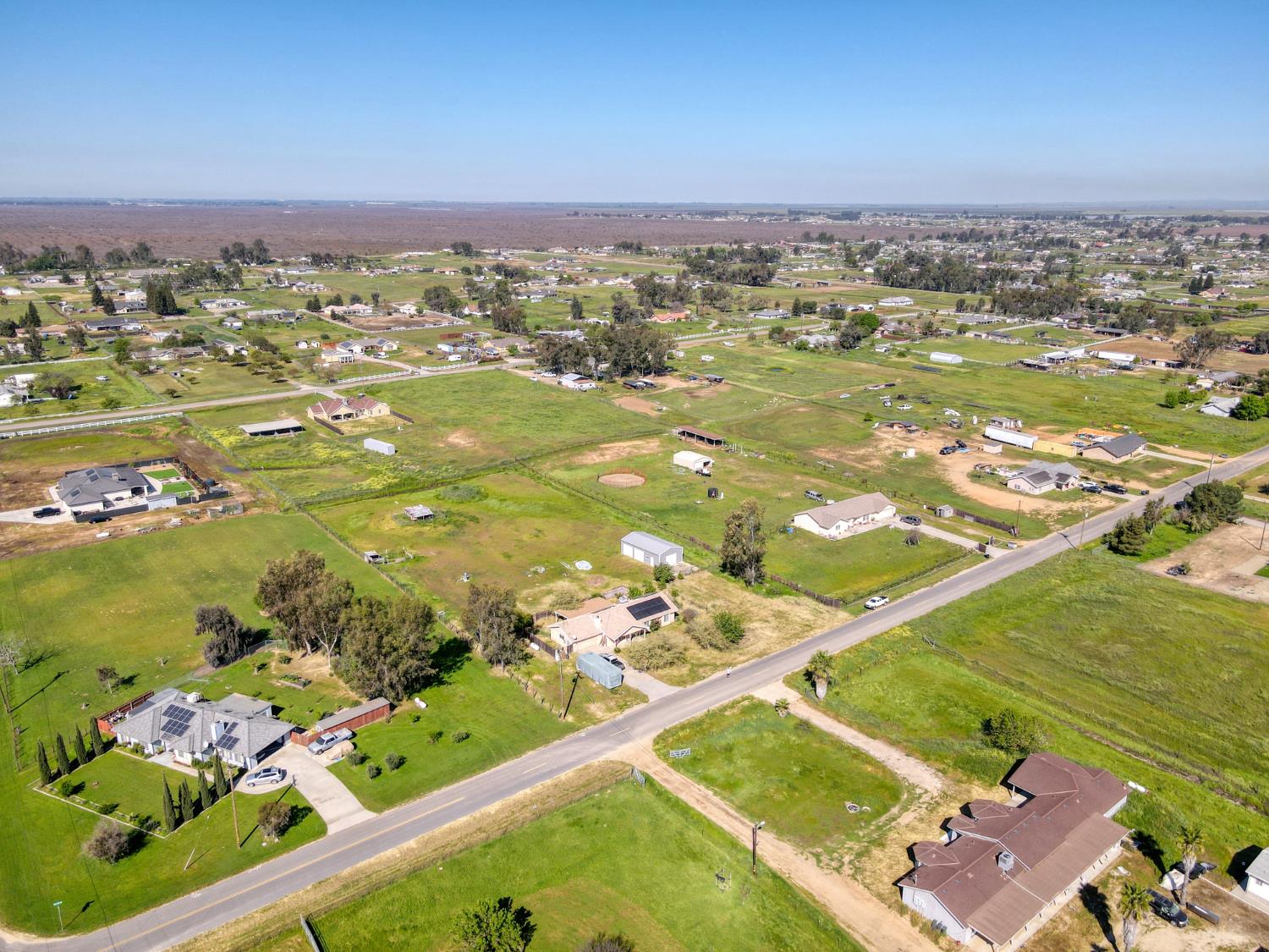 19650 Oakhill Road Madera, CA 93638 - Photo 45 of 49 an aerial view of residential houses with outdoor space