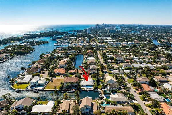 an aerial view of city and lake