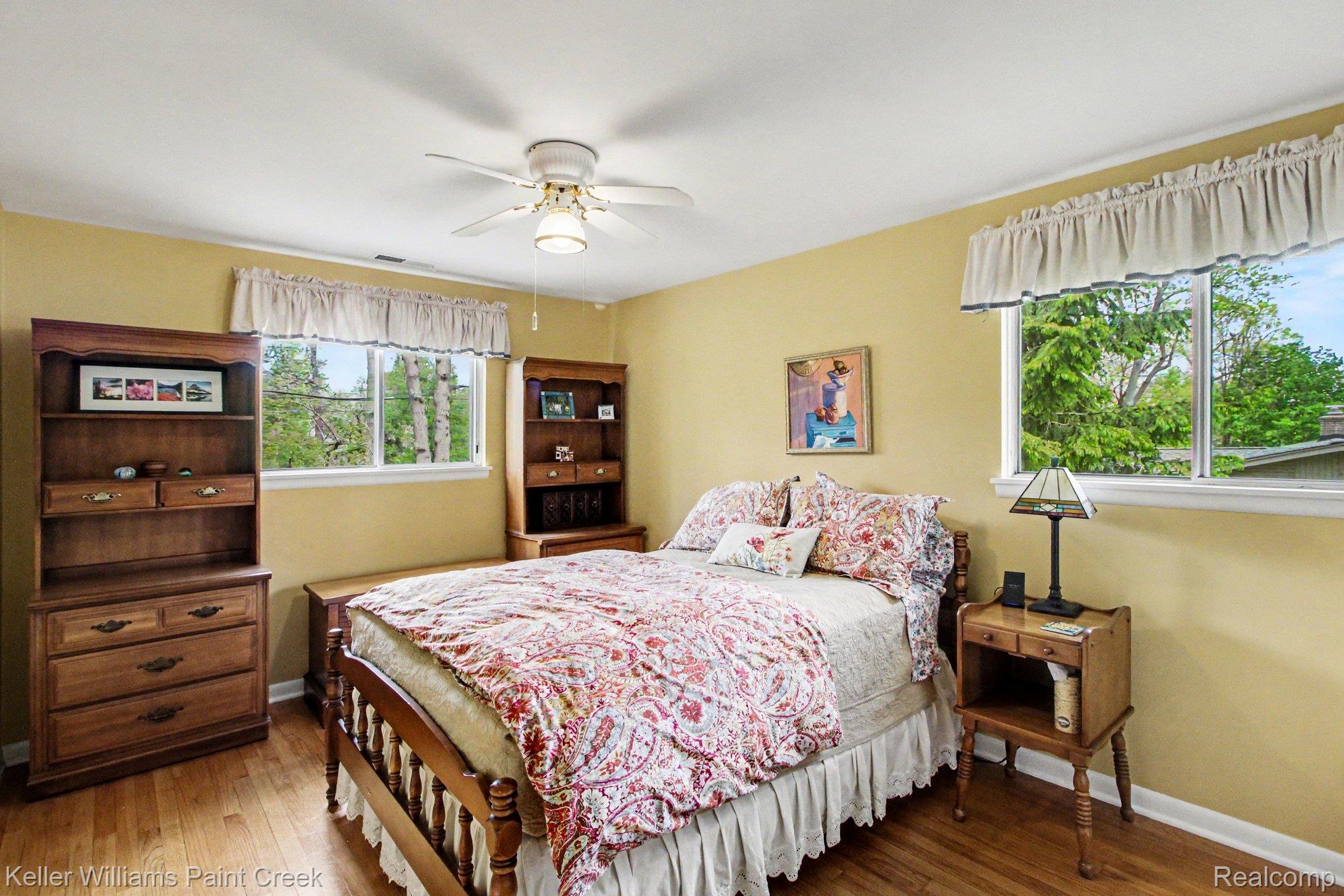 3370 Aquinas Drive Rochester, MI 48309 - Photo 8 of 25 Bedroom with wood finished floors and a ceiling fan