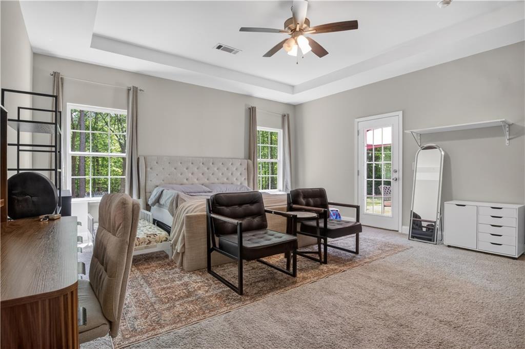 584 Tuxedo Drive Commerce, GA 30530 - Photo 13 of 30 a living room with furniture and a window