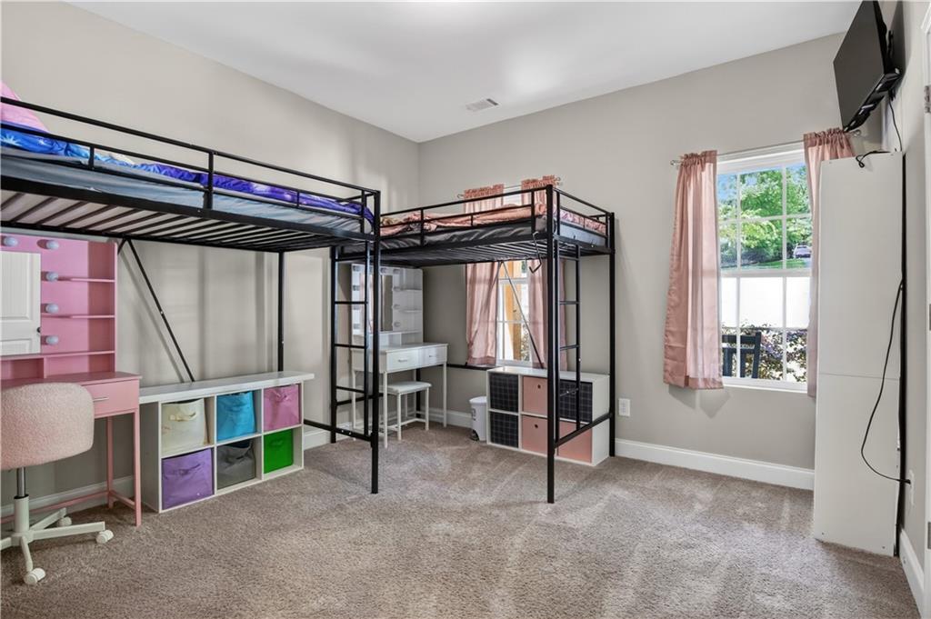 584 Tuxedo Drive Commerce, GA 30530 - Photo 19 of 30 a view of an empty room with a window