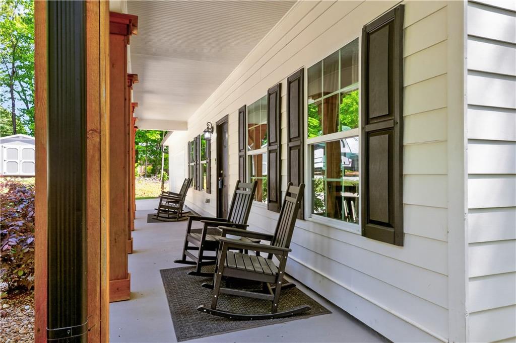 584 Tuxedo Drive Commerce, GA 30530 - Photo 2 of 30 a view of balcony with chairs