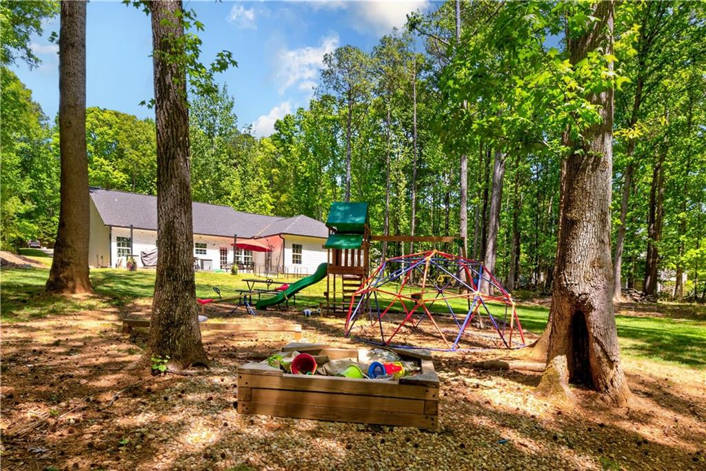 584 Tuxedo Drive Commerce, GA 30530 - Photo 22 of 30 a view of swimming pool with a patio