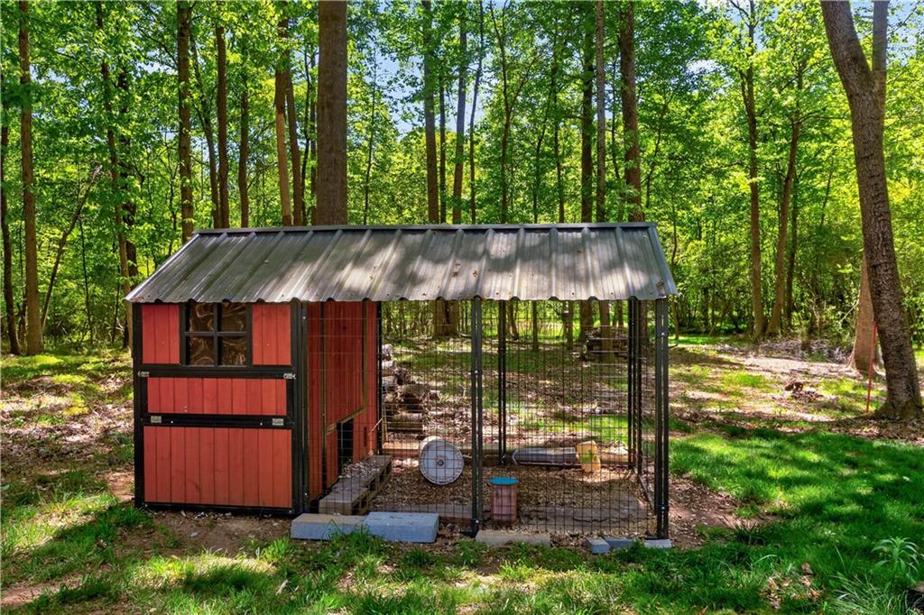 584 Tuxedo Drive Commerce, GA 30530 - Photo 23 of 30 an outdoor sitting area with golf course