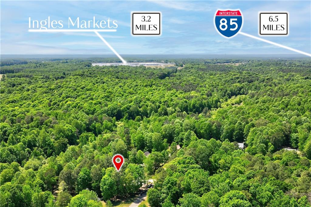 584 Tuxedo Drive Commerce, GA 30530 - Photo 26 of 30 a view of sign board with lots of green space