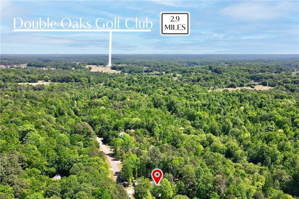 584 Tuxedo Drive Commerce, GA 30530 - Photo 27 of 30 a view of a street with flower plants