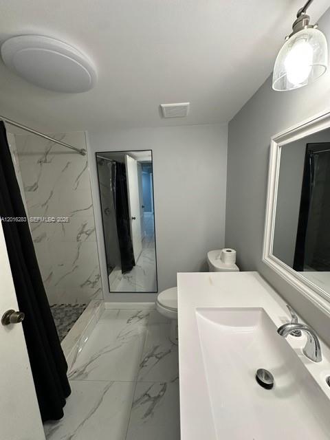 10975 Southwest 107th Street, Unit 110 Miami, FL 33176 - Photo 12 of 26 a utility room with dryer and washer