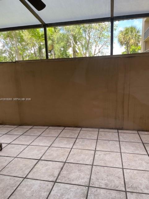 10975 Southwest 107th Street, Unit 110 Miami, FL 33176 - Photo 22 of 26 a view of an empty room and window