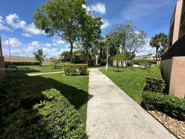 10975 Southwest 107th Street, Unit 110 Miami, FL 33176 - Photo 25 of 26 a view of a park with plants and trees