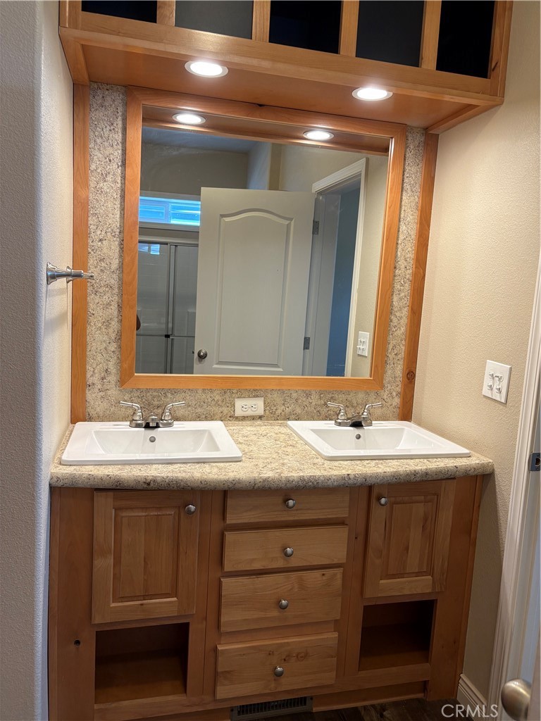 5548 Newland Road Paradise, CA 95969 - Photo 10 of 23 a bathroom with a sink and a mirror
