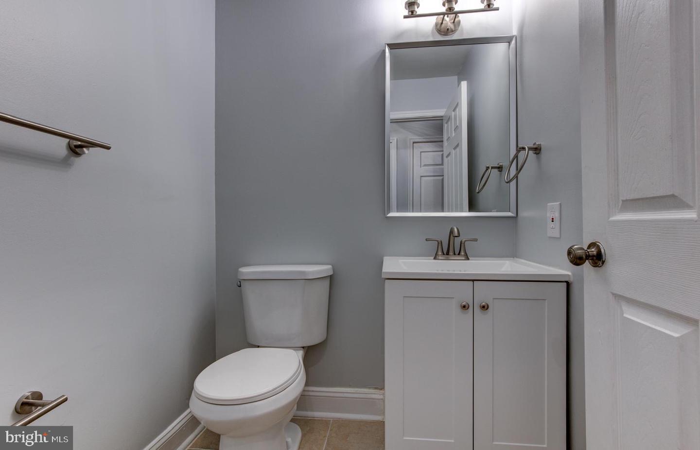 3537 Reisterstown Road Baltimore, MD 21215 - Photo 12 of 23 Main Floor Half Bath
