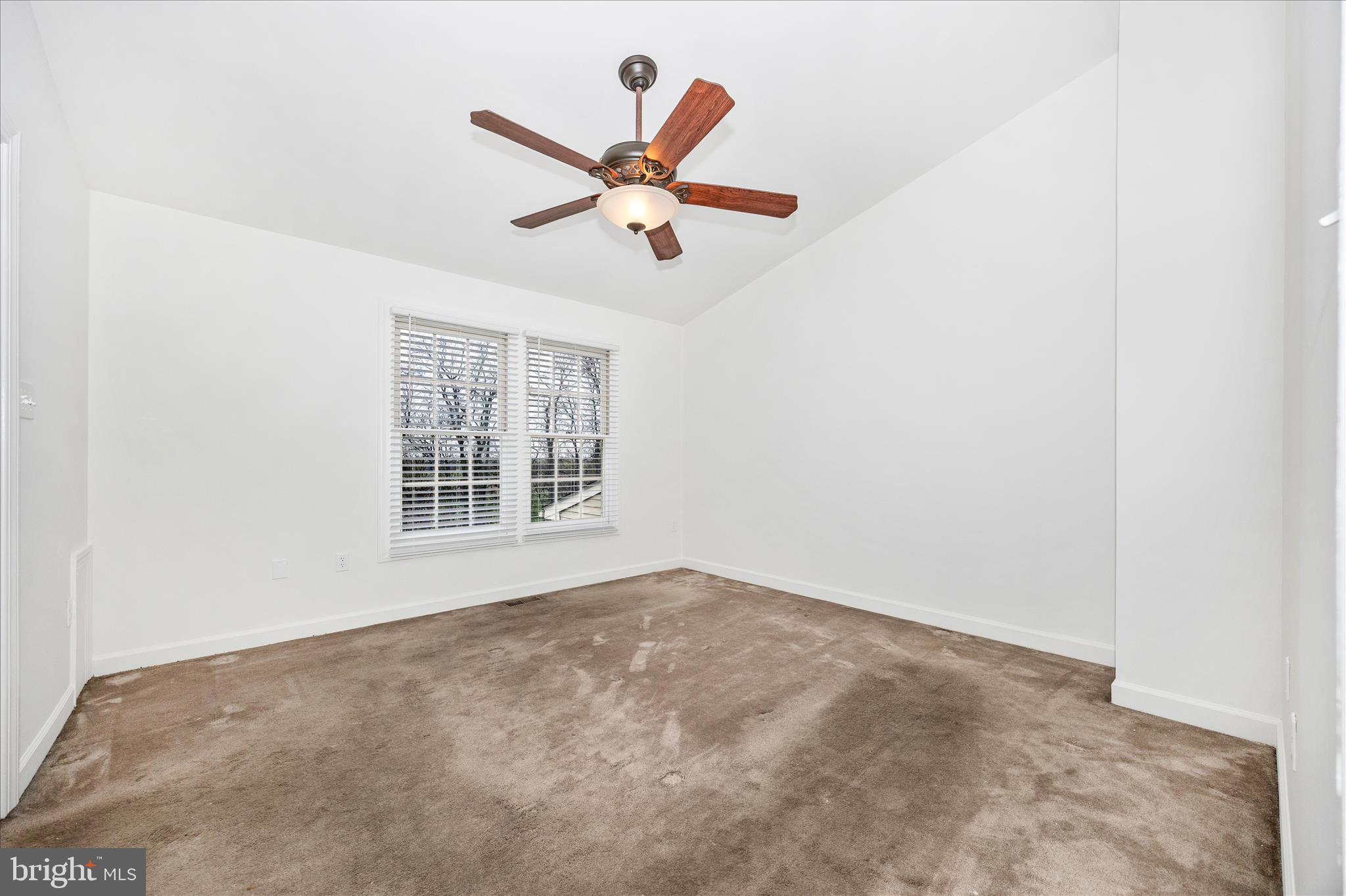 5577 Rivendell Place Frederick, MD 21703 - Photo 19 of 51 an empty room with windows and fan