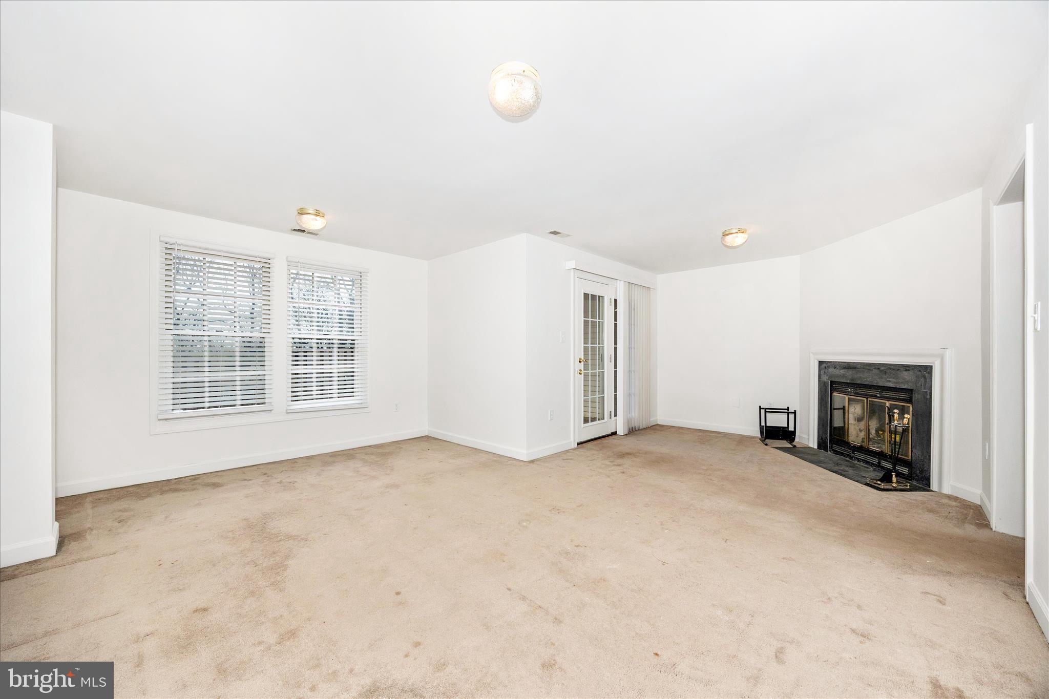 5577 Rivendell Place Frederick, MD 21703 - Photo 31 of 51 an empty room with windows