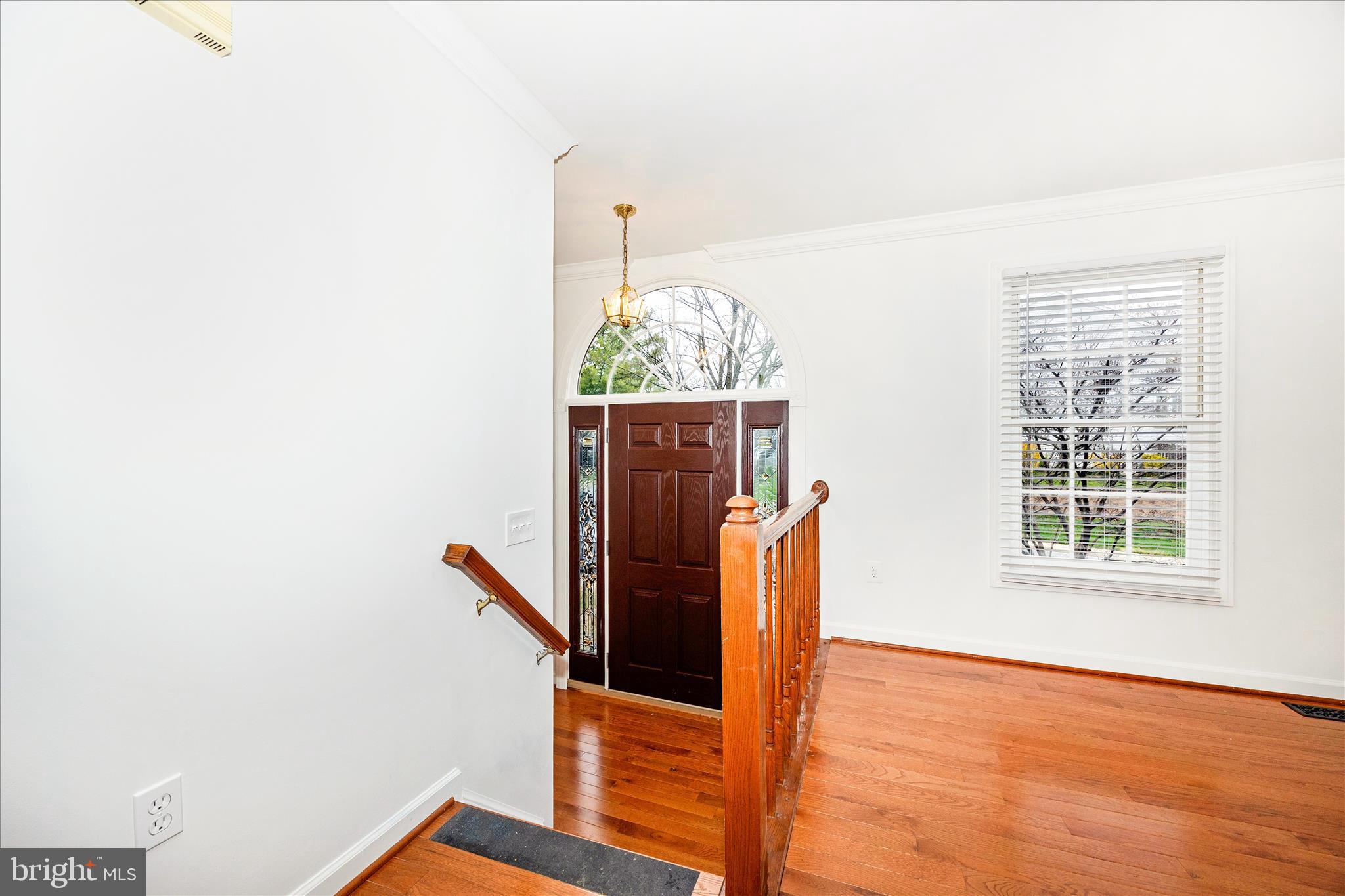 5577 Rivendell Place Frederick, MD 21703 - Photo 4 of 51 a view of entryway with wooden floor