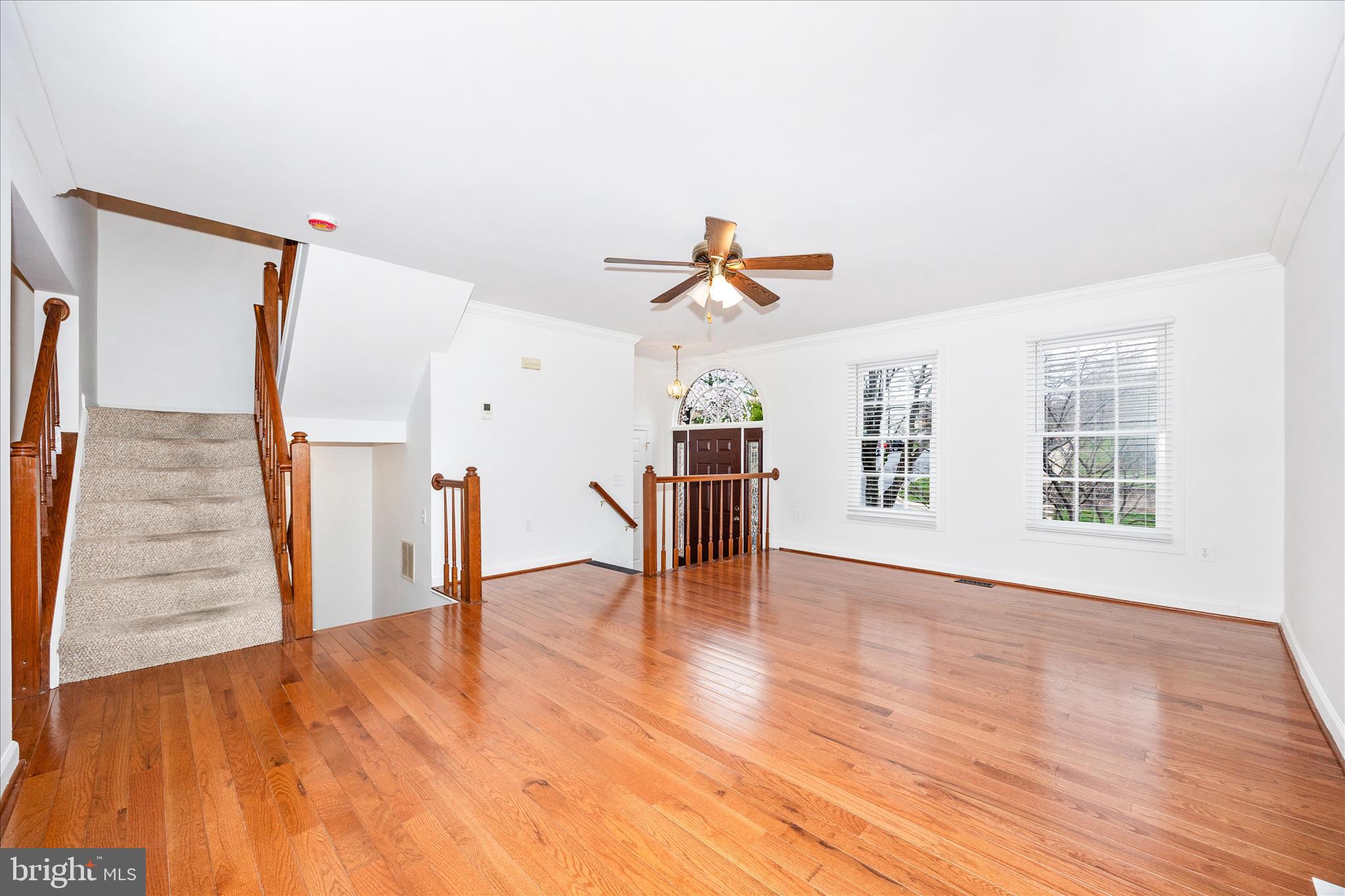 5577 Rivendell Place Frederick, MD 21703 - Photo 5 of 51 a view of empty room with wooden floor and fan