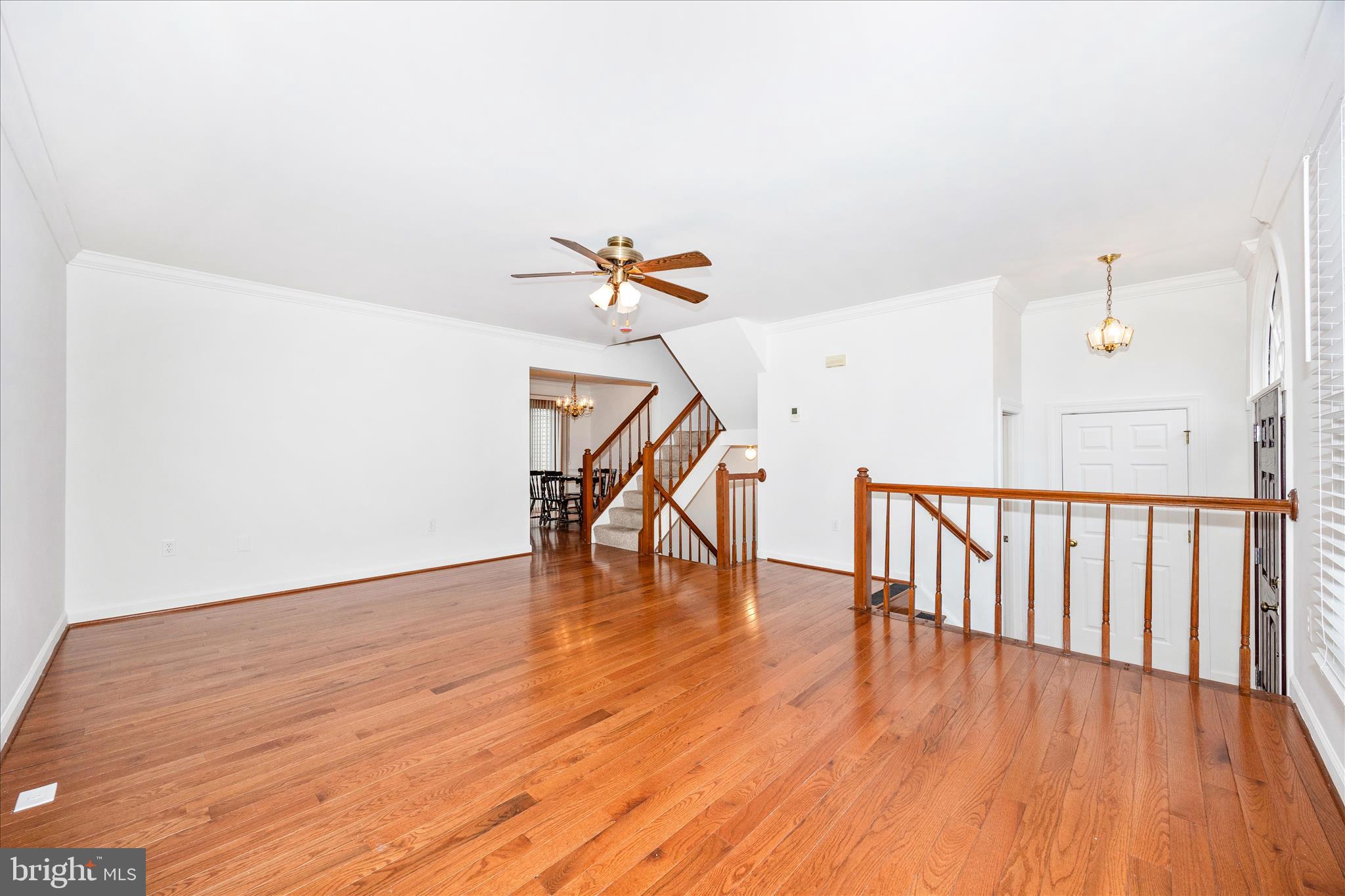 5577 Rivendell Place Frederick, MD 21703 - Photo 7 of 51 a view of entryway with wooden floor