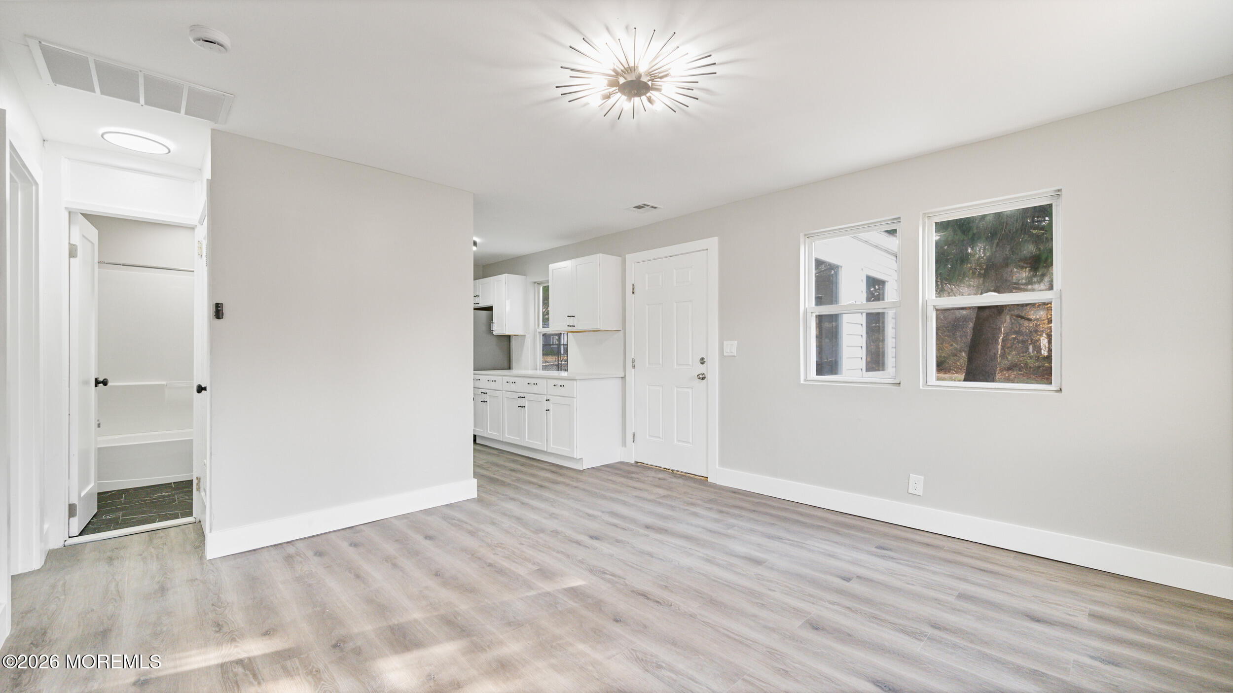 4 Story Street New Egypt, NJ 08533 - Photo 9 of 16 a view of empty room with wooden floor and window