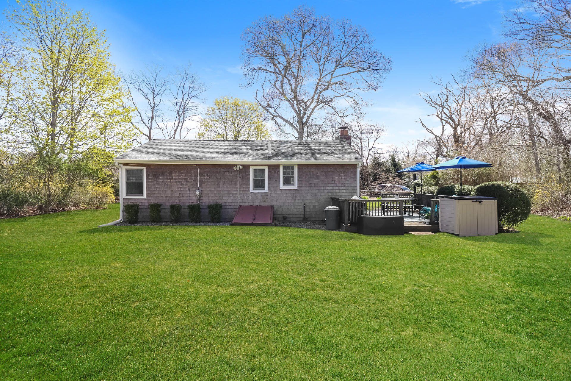 50 Oak Ridge Road Eastham, MA 02642 - Photo 19 of 20 a backyard of a house with seating space