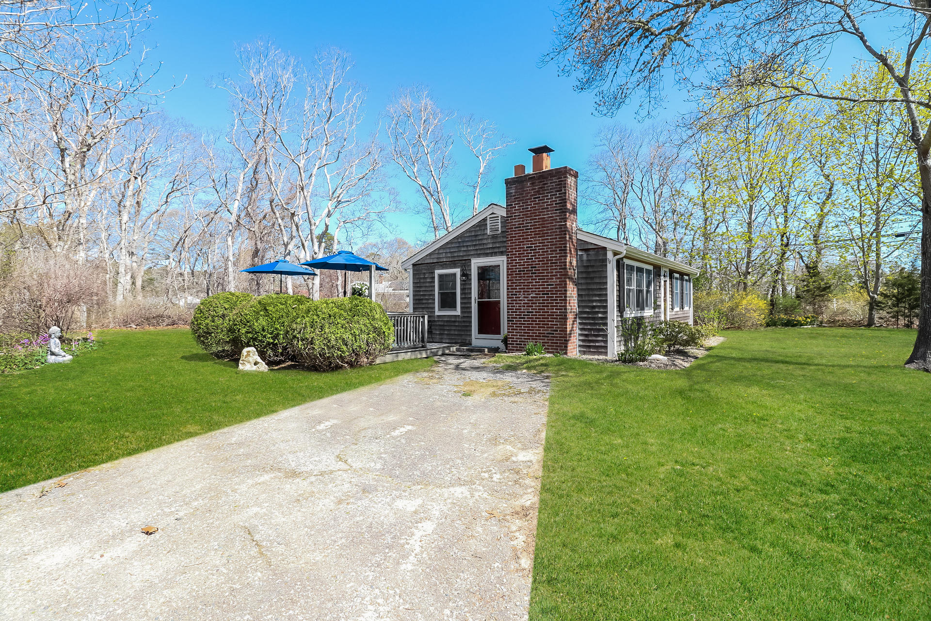50 Oak Ridge Road Eastham, MA 02642 - Photo 20 of 20 a view of a house with a yard