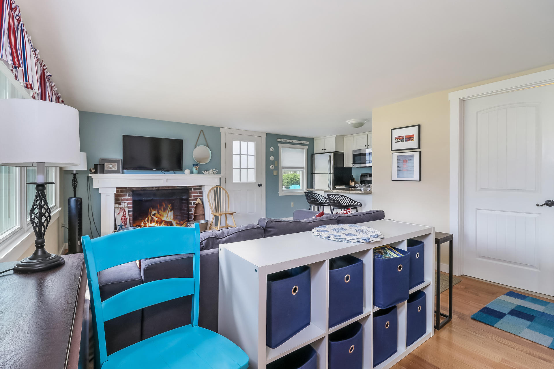 50 Oak Ridge Road Eastham, MA 02642 - Photo 9 of 20 a living room with furniture fireplace and a flat screen tv