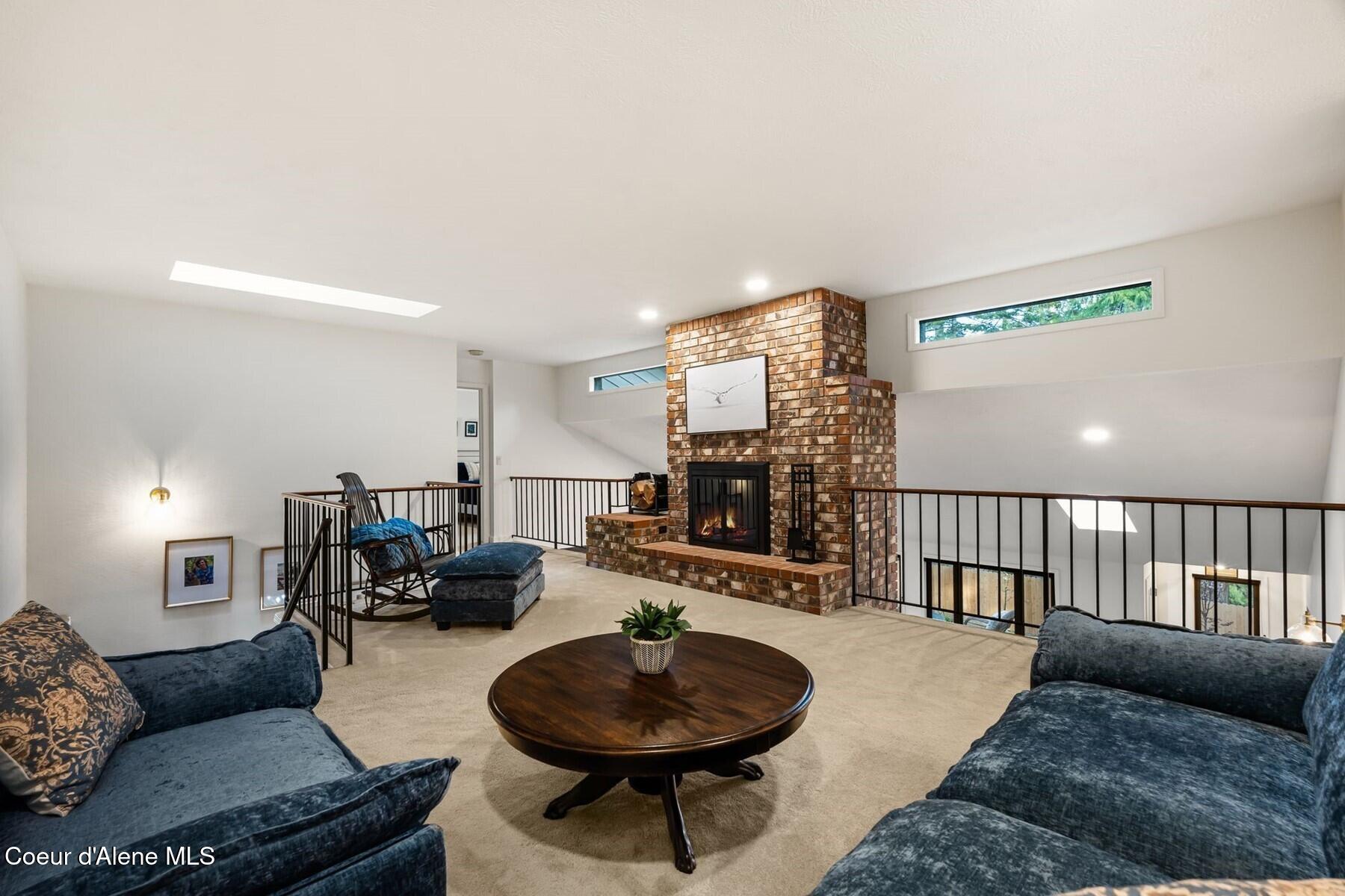5884 East Hayden Lake Road Hayden, ID 83835 - Photo 28 of 66 Cozy Upper Level Family Room