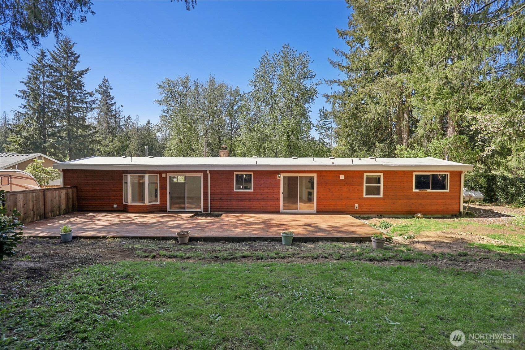 28601 Southeast 225th Street Maple Valley, WA 98038 - Photo 29 of 40 a front view of a house with a yard