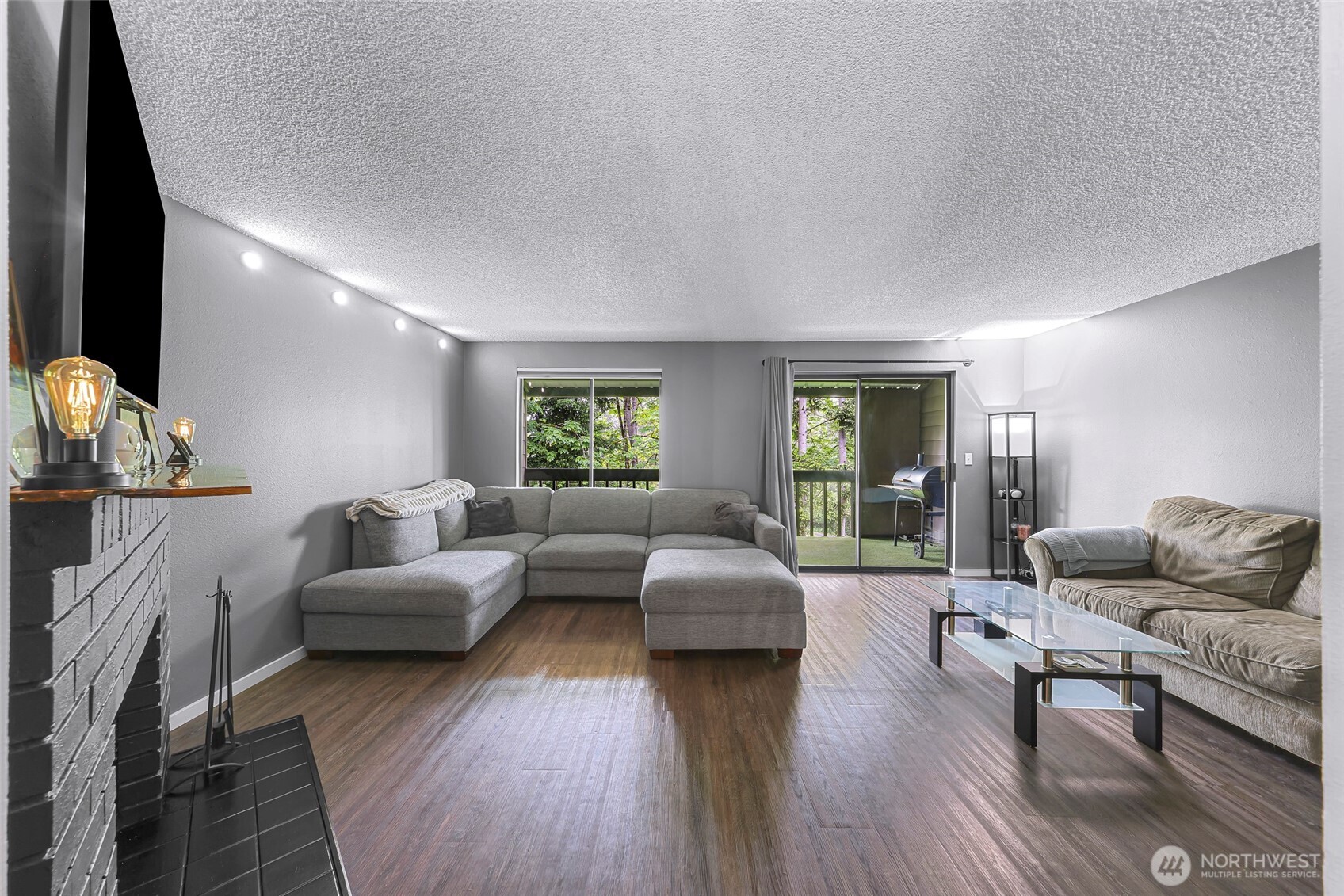1211 North 8th Street, Unit 2 Mount Vernon, WA 98273 - Photo 18 of 38 a living room with furniture and a wooden floor