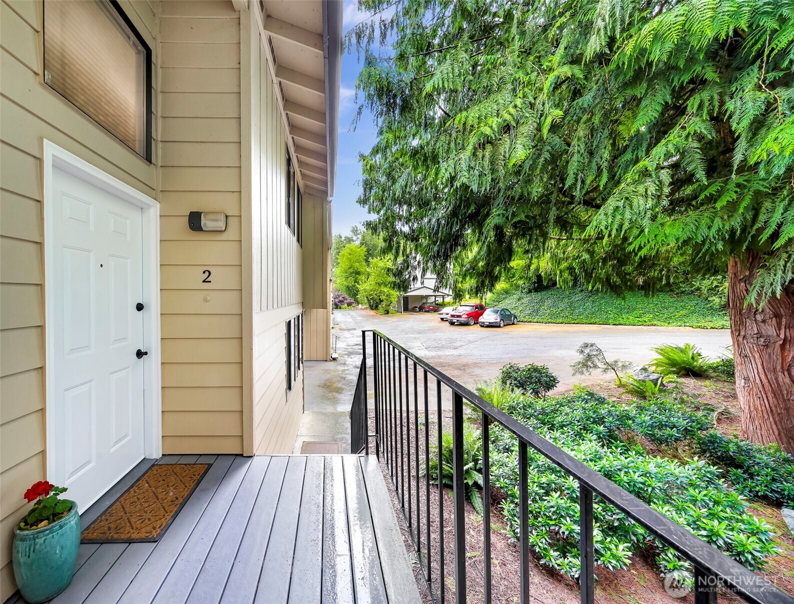 1211 North 8th Street, Unit 2 Mount Vernon, WA 98273 - Photo 2 of 38 a view of a balcony with wooden floor