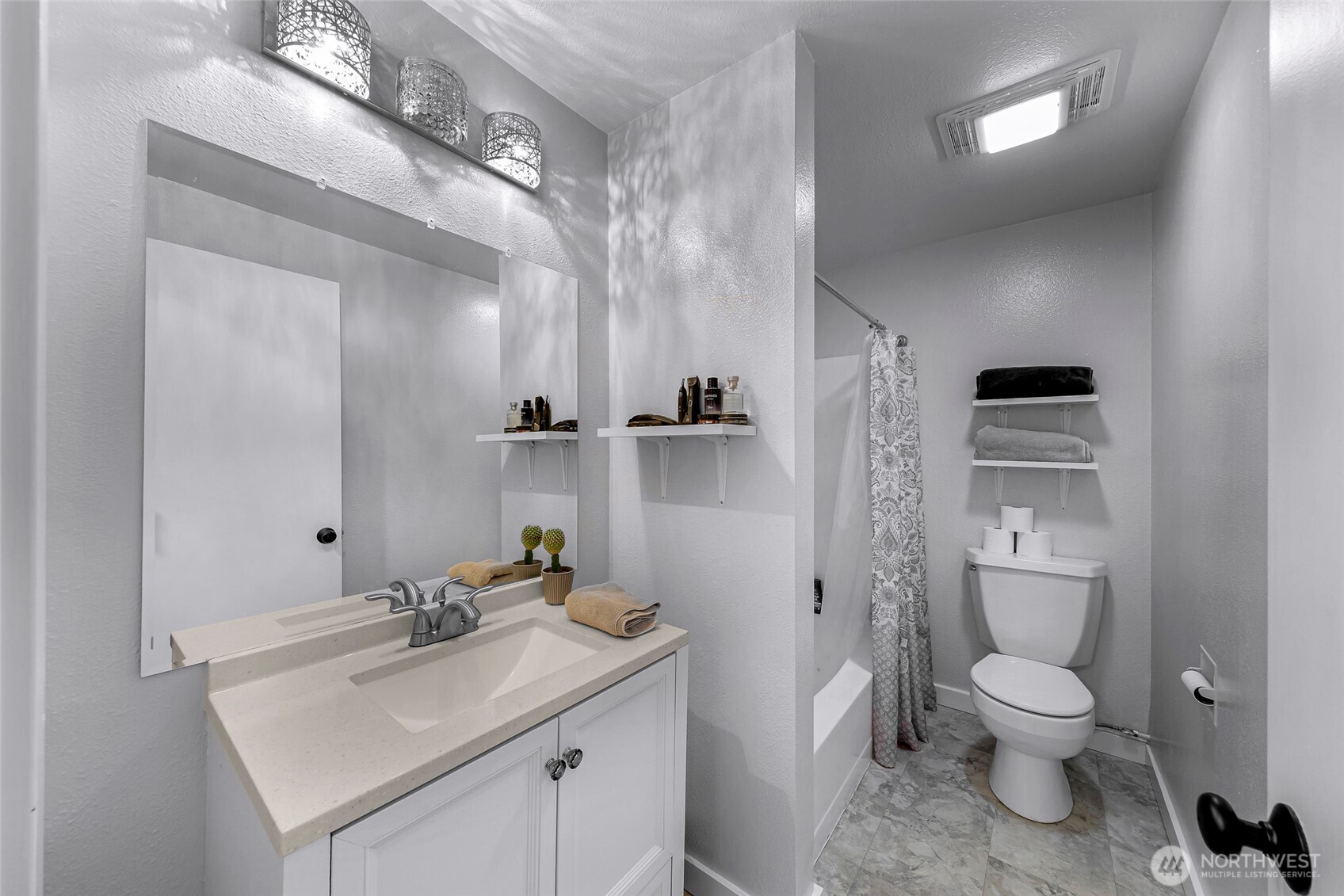 1211 North 8th Street, Unit 2 Mount Vernon, WA 98273 - Photo 26 of 38 a bathroom with a toilet sink and mirror