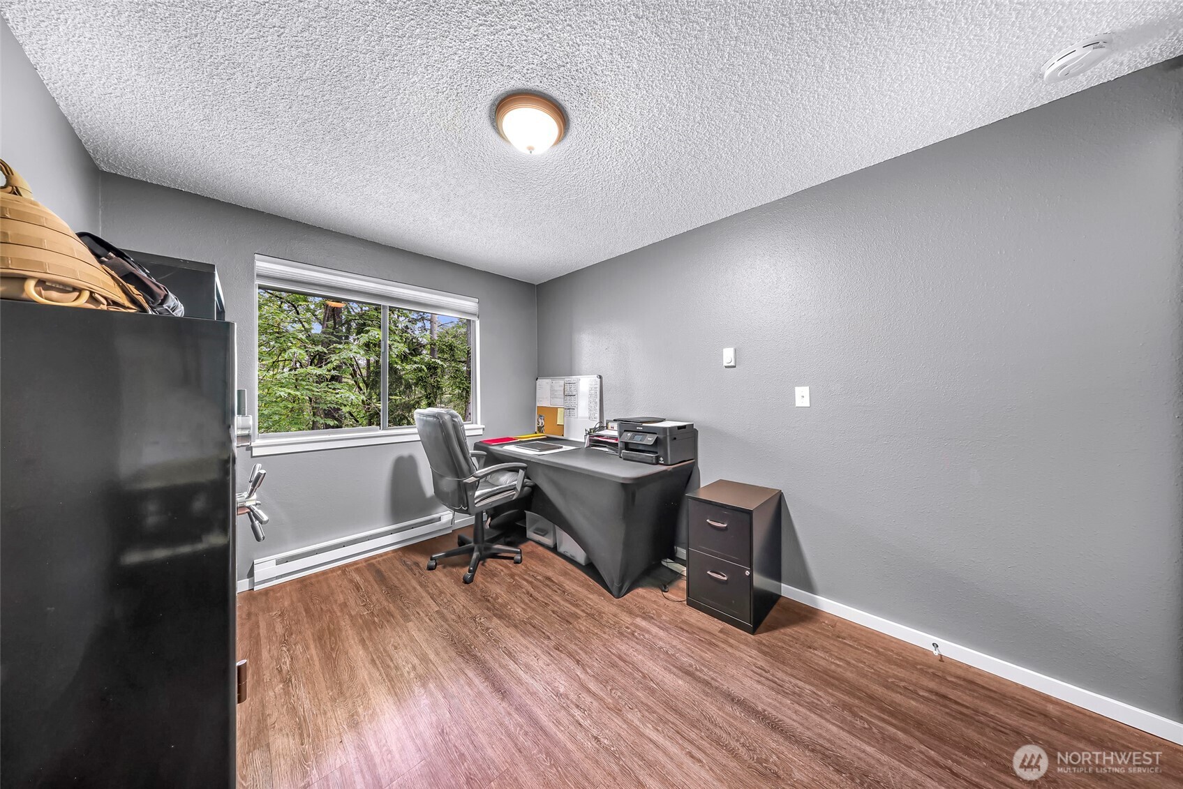 1211 North 8th Street, Unit 2 Mount Vernon, WA 98273 - Photo 30 of 38 a workspace with furniture window and wooden floor