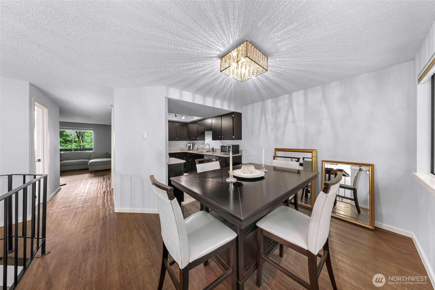1211 North 8th Street, Unit 2 Mount Vernon, WA 98273 - Photo 7 of 38 a view of a dining room with furniture and wooden floor