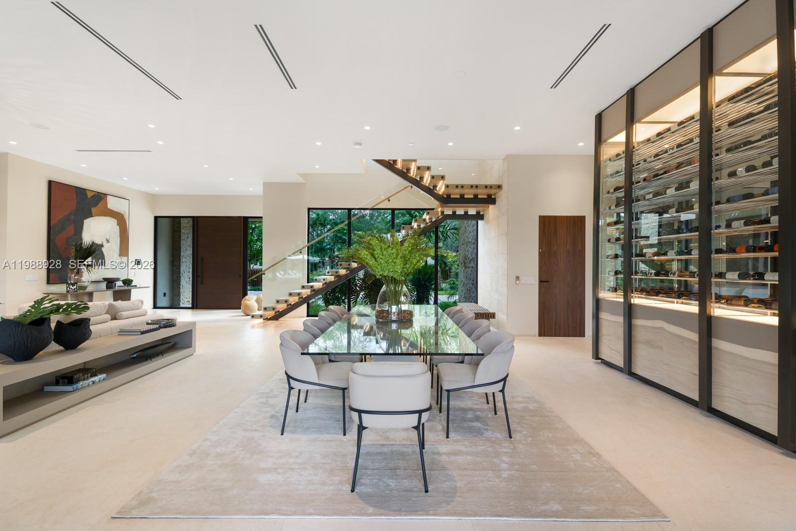 5545 Southwest 81st Terrace Miami, FL 33143 - Photo 19 of 100 a dining room with furniture and a floor to ceiling window