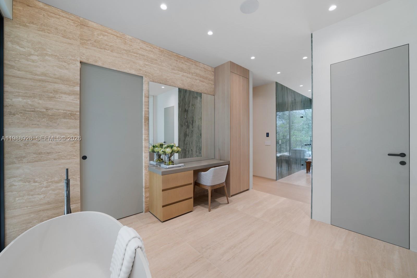 5545 Southwest 81st Terrace Miami, FL 33143 - Photo 33 of 100 a spacious bedroom with a bed and a view of bathroom