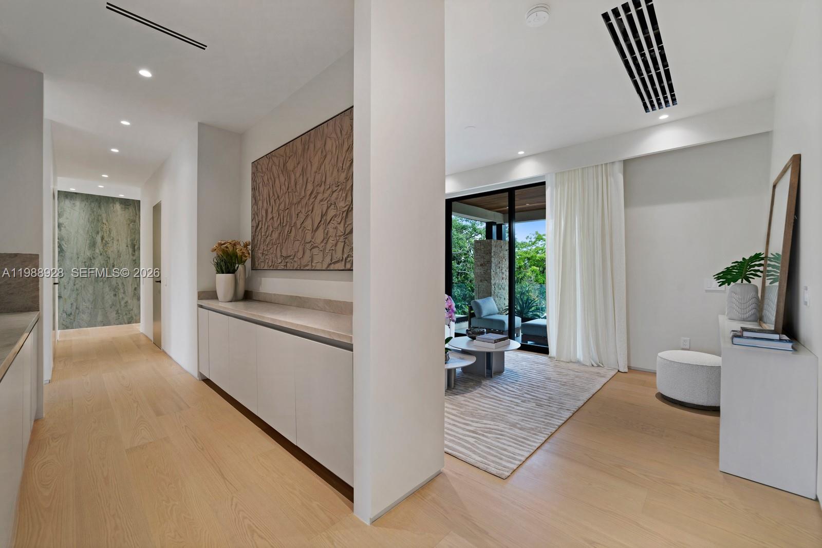 5545 Southwest 81st Terrace Miami, FL 33143 - Photo 56 of 100 a large white room with a couch and a large window