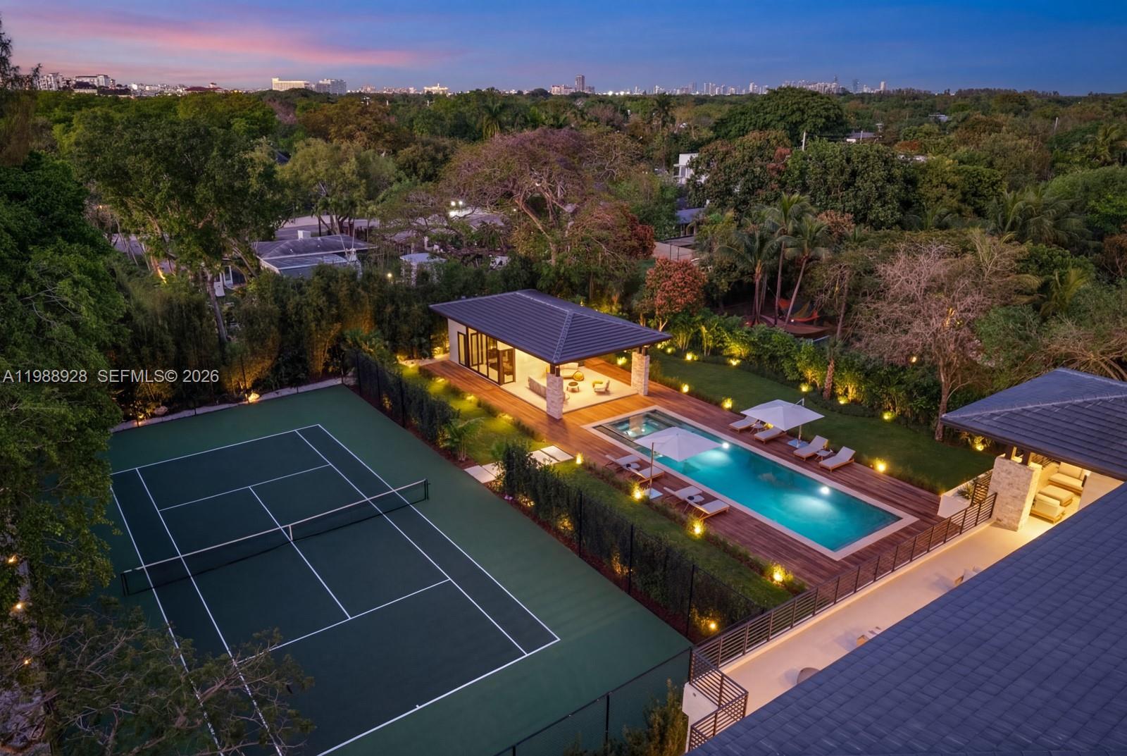 5545 Southwest 81st Terrace Miami, FL 33143 - Photo 85 of 100 an aerial view of a tennis ground and a cars park side of the road