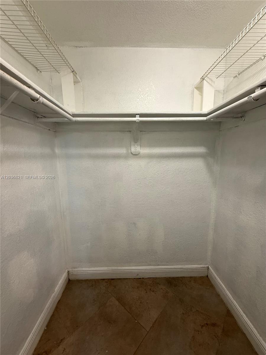 14770 Southwest 60th Street Miami, FL 33193 - Photo 9 of 16 a view of an empty room