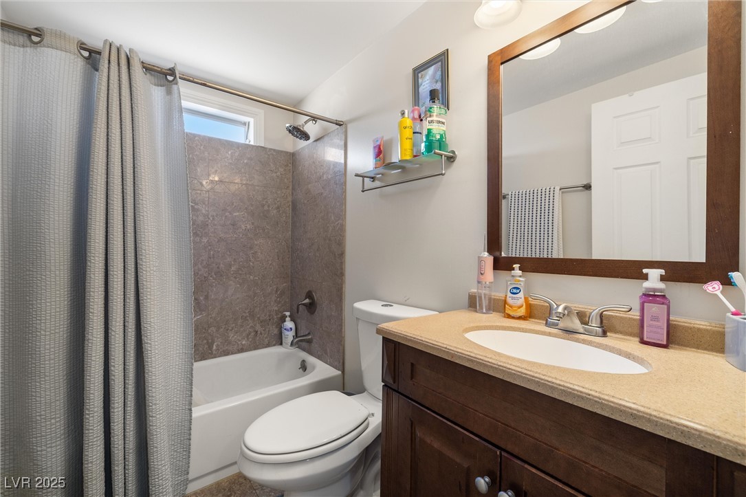 3581 West Dyer Road Pahrump, NV 89048 - Photo 20 of 31 Bathroom featuring vanity and shower / tub combo