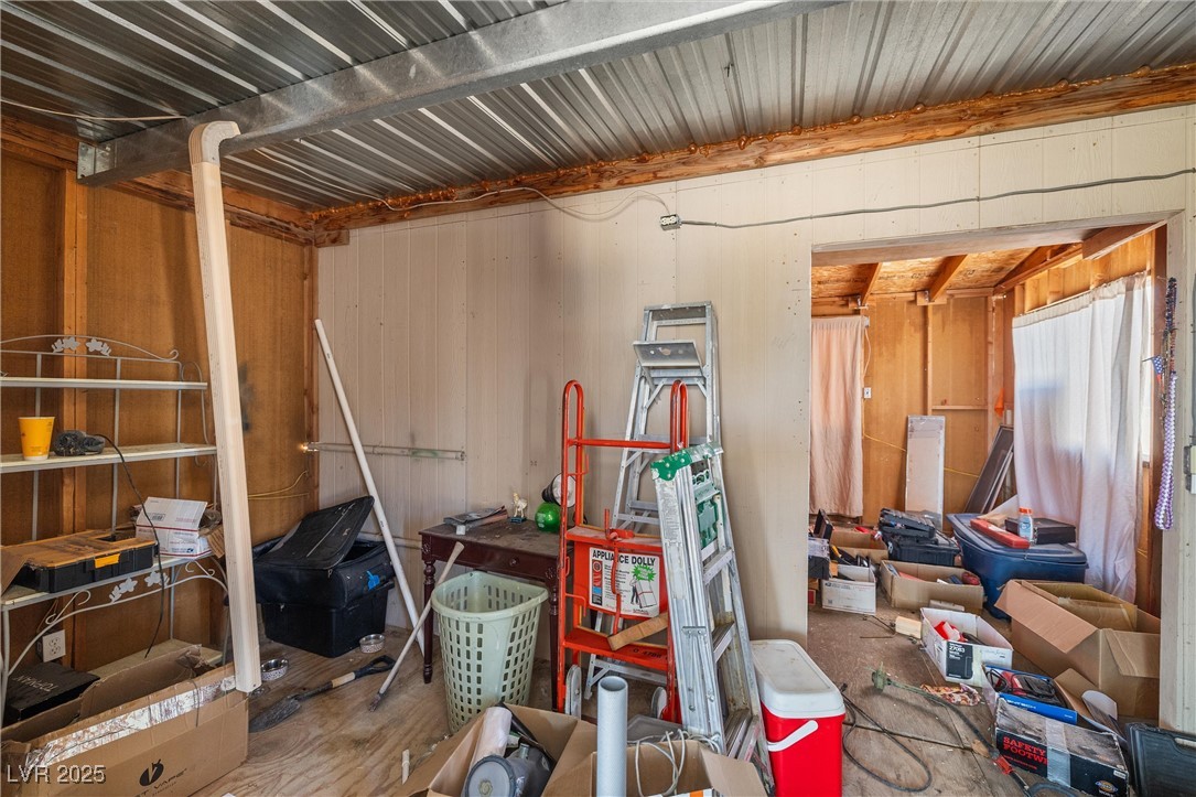 3581 West Dyer Road Pahrump, NV 89048 - Photo 28 of 31 Miscellaneous room with wood walls