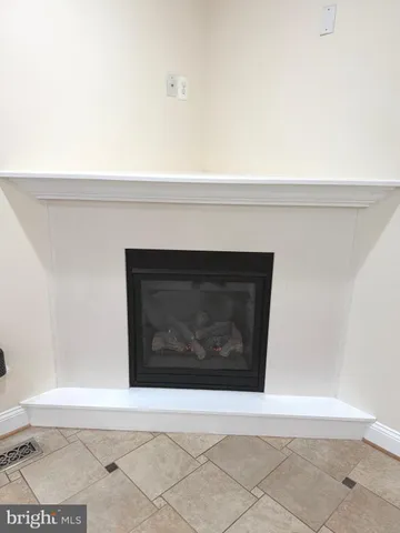 a bathroom with a granite countertop sink toilet a mirror and vanity
