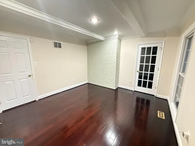 a large tree in the middle of a yard