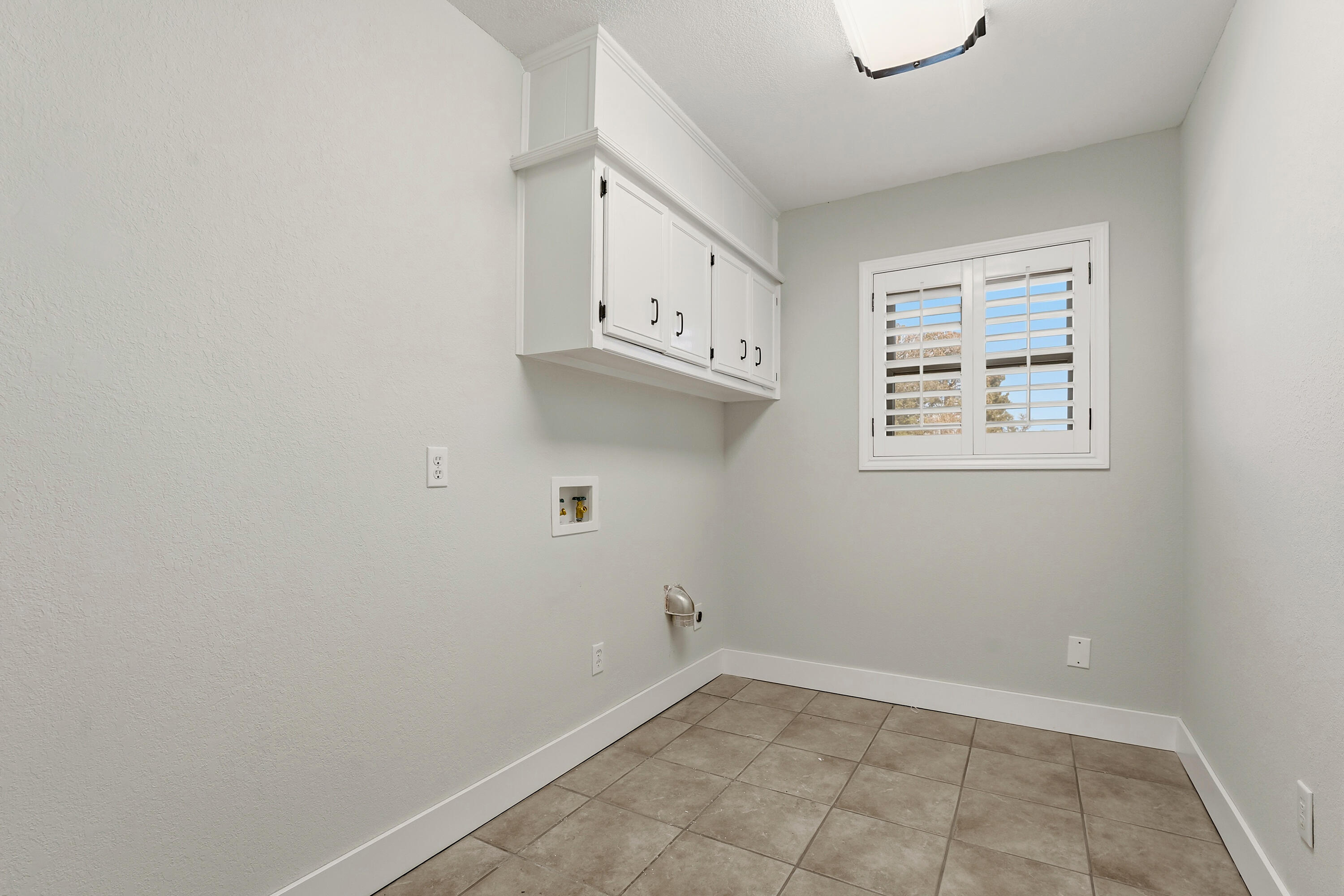 5002 94th Street Lubbock, TX 79424 - Photo 28 of 30 a view of an empty room with a window