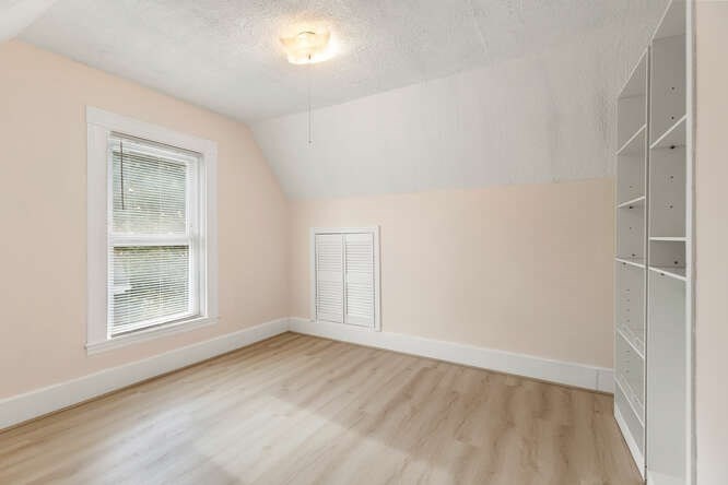 20 Fairmount Street, Unit 2 Everett, MA 02149 - Photo 10 of 12 an empty room with a empty space and windows