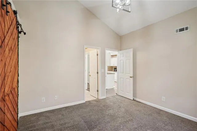 an empty room with a bathroom