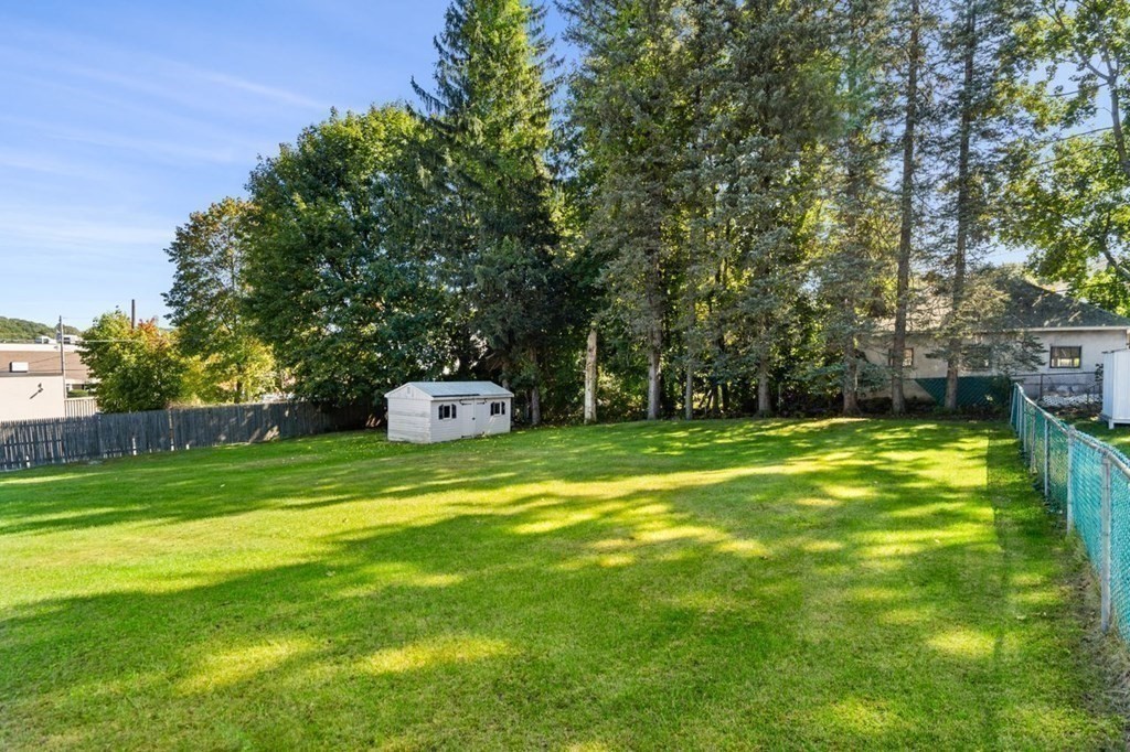 9 Butler Street Worcester, MA 01607 - Photo 34 of 39 a garden view with a fountain