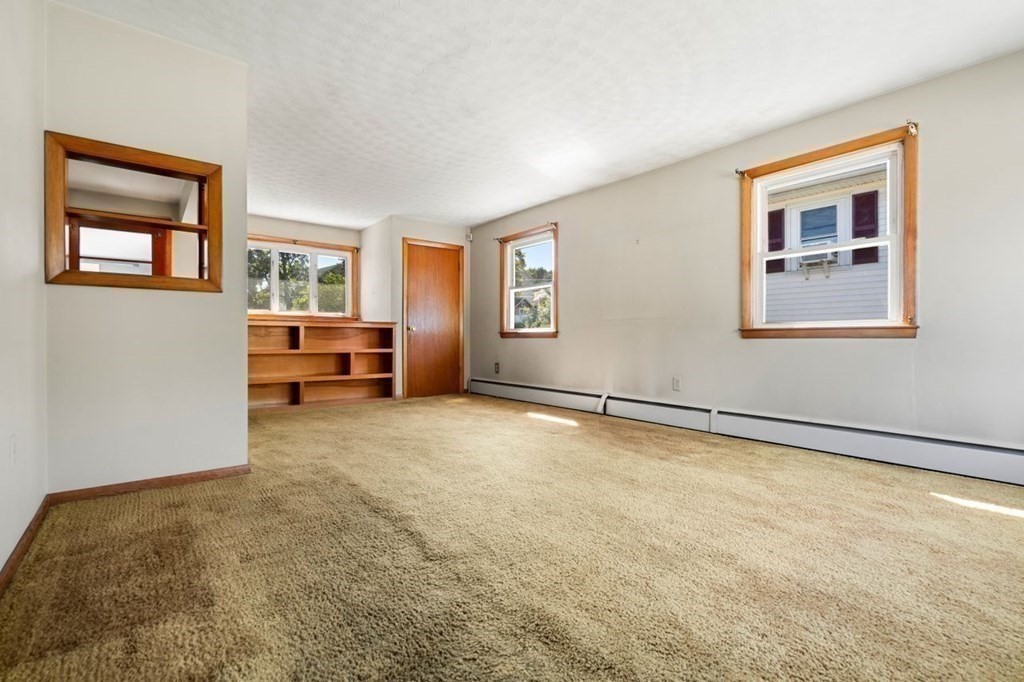 9 Butler Street Worcester, MA 01607 - Photo 4 of 39 a view of livingroom with furniture and windows