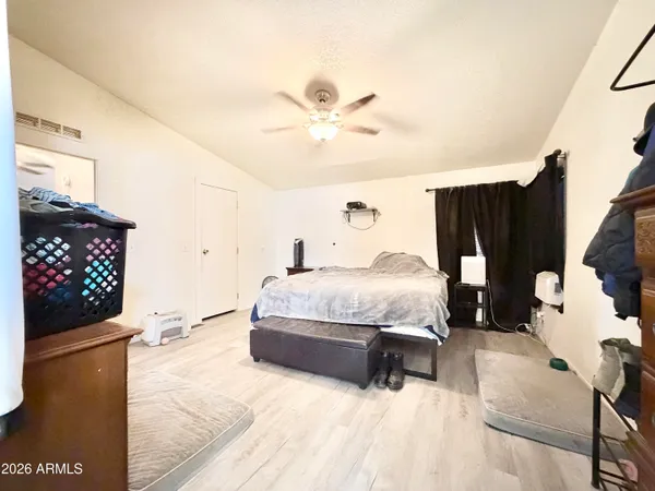 a bathroom with a double vanity sink toilet and shower