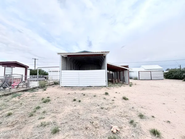 a view of garage and front door