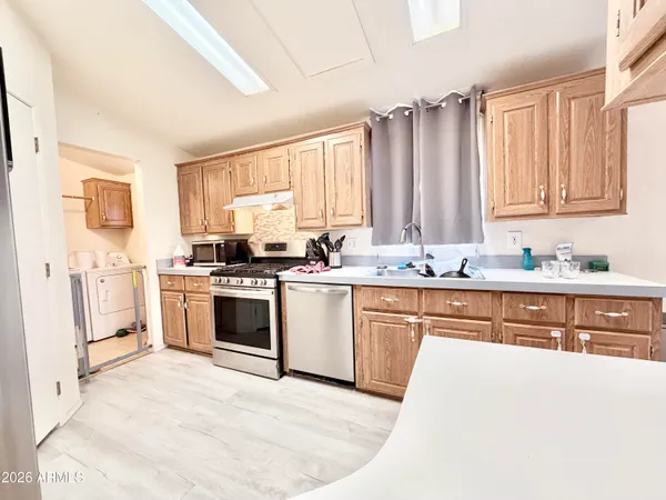 a room with cabinets and wooden floor