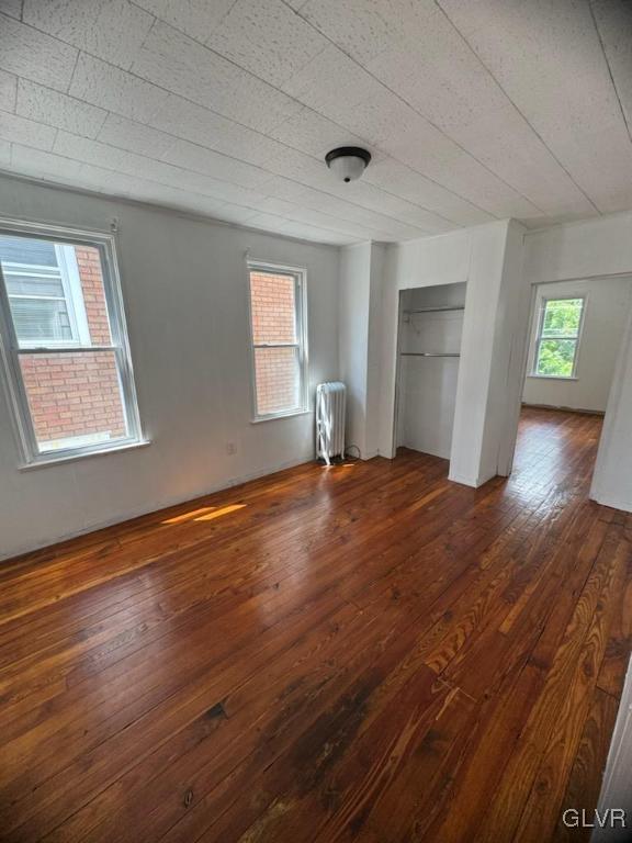 134 West Ridge Street Coaldale, PA 18218 - Photo 16 of 31 an empty room with wooden floor and windows